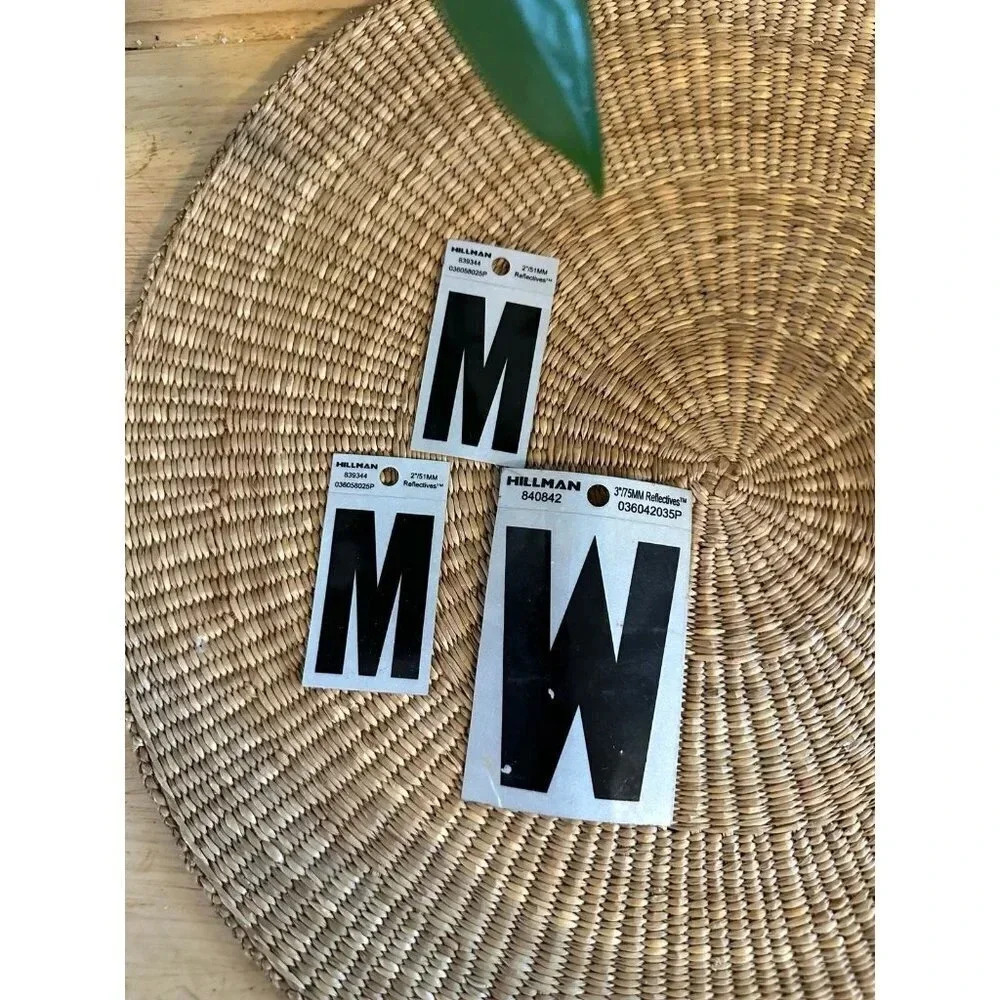 Hillman Sign Center (2) M’s & (1) W reflective letters